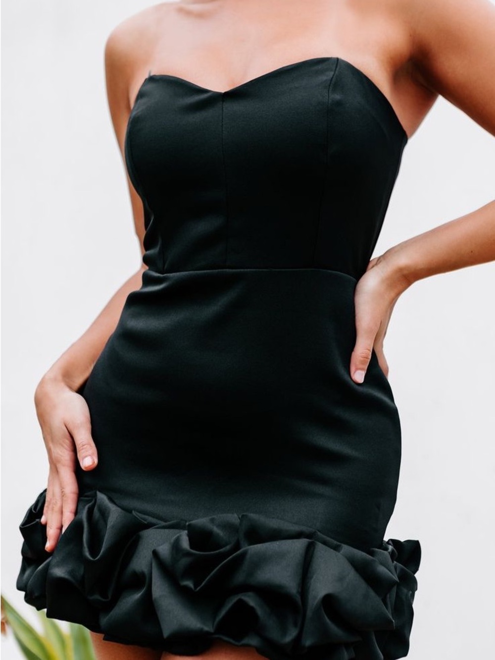 The Impeccable Pig Strapless Black Ruffle-Hem Mini Dress